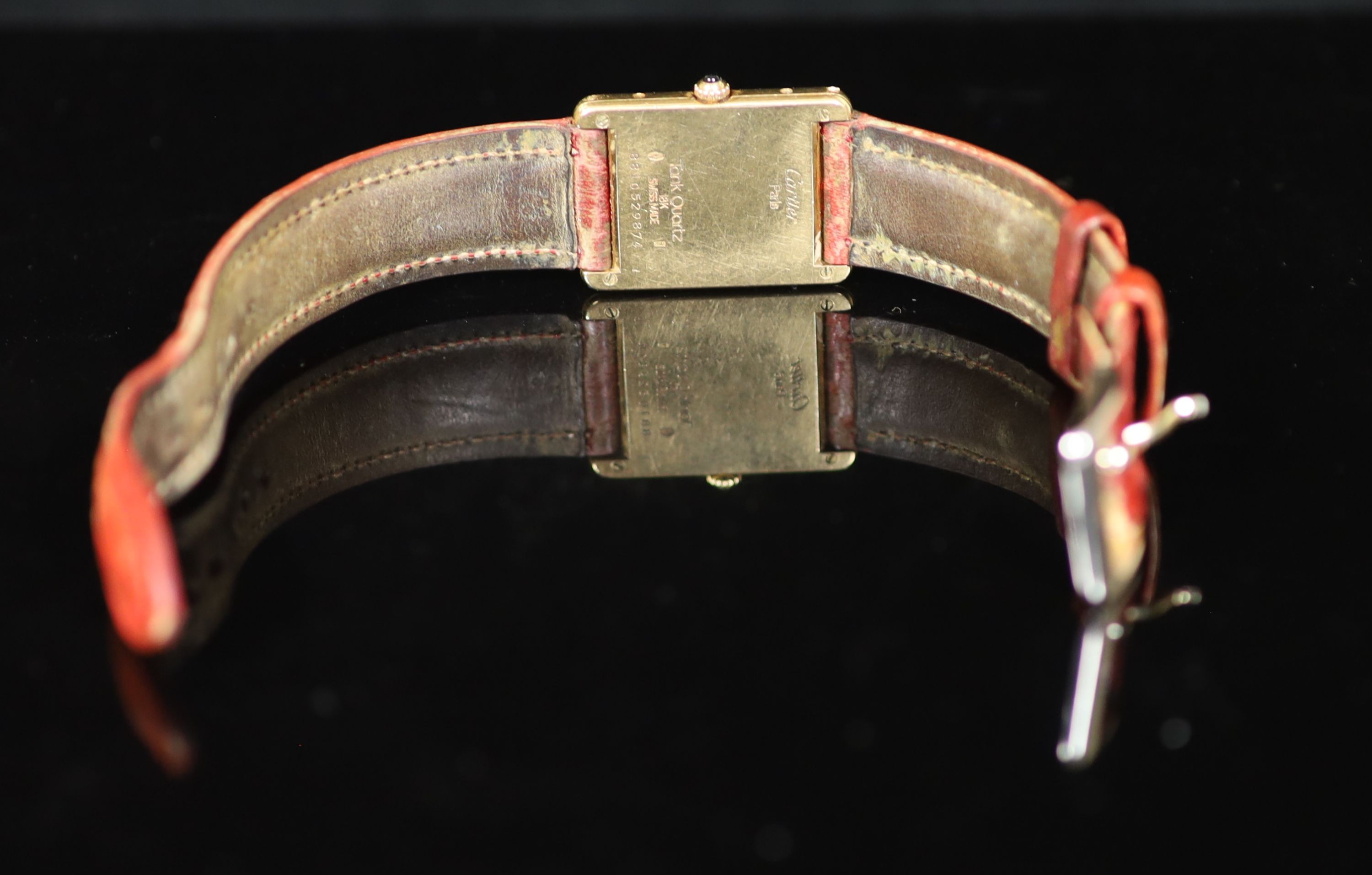 A lady's 18ct gold Cartier Tank Louis quartz wrist watch, on a leather strap